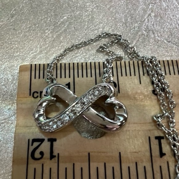 Silver Hearts Infinity Symbol Pendant Necklace with simulated Diamond accents - Picture 6 of 13